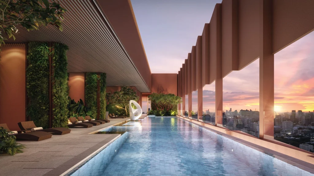 Swimming pool view at NUE Epic Asok-Rama 9, a large-scale residential project in Bangkok’s new CBD, featuring multiple towers and extensive facilities.